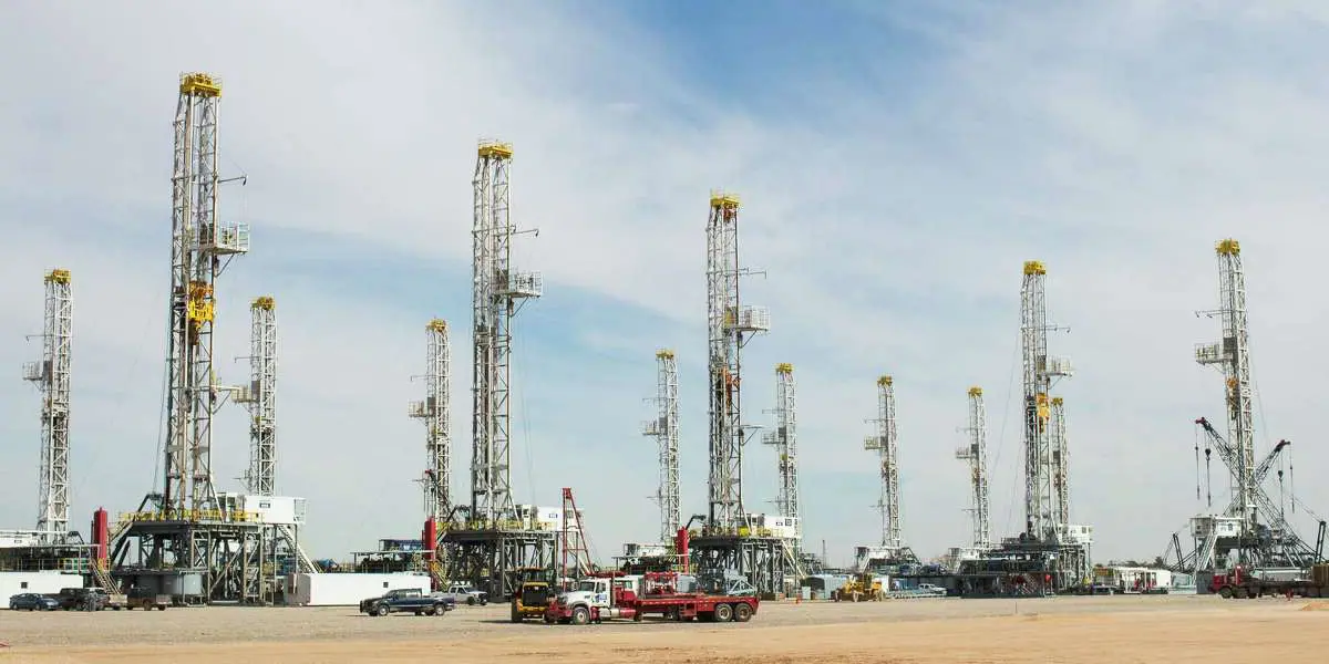 Land drilling rigs in an equipment yard